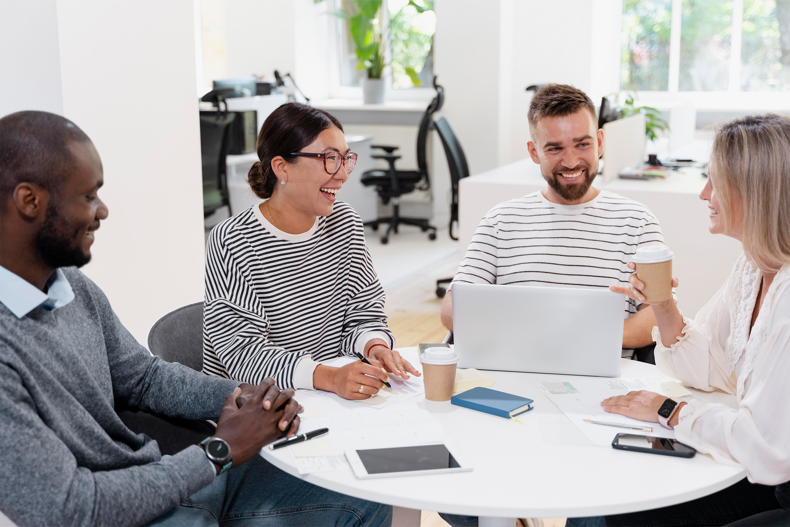 Small business of employees discussing fractional HR